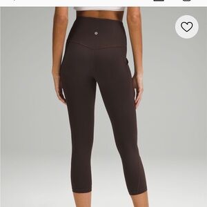 NWT, Lululemon 23” aligns with pockets! Espresso color! $128! Size 6!